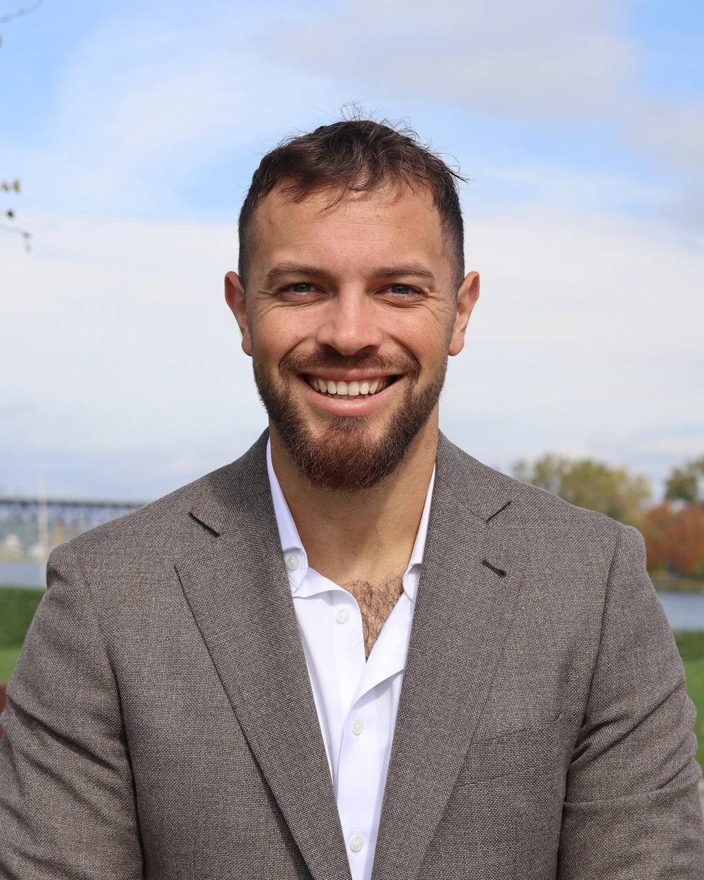 Eric Layden outdoors by the Hudson River